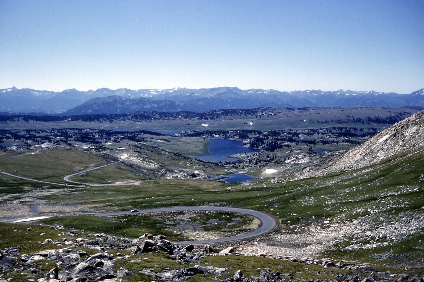 Switchbacks winding across the Beartooth Plateau past small alpine lakes