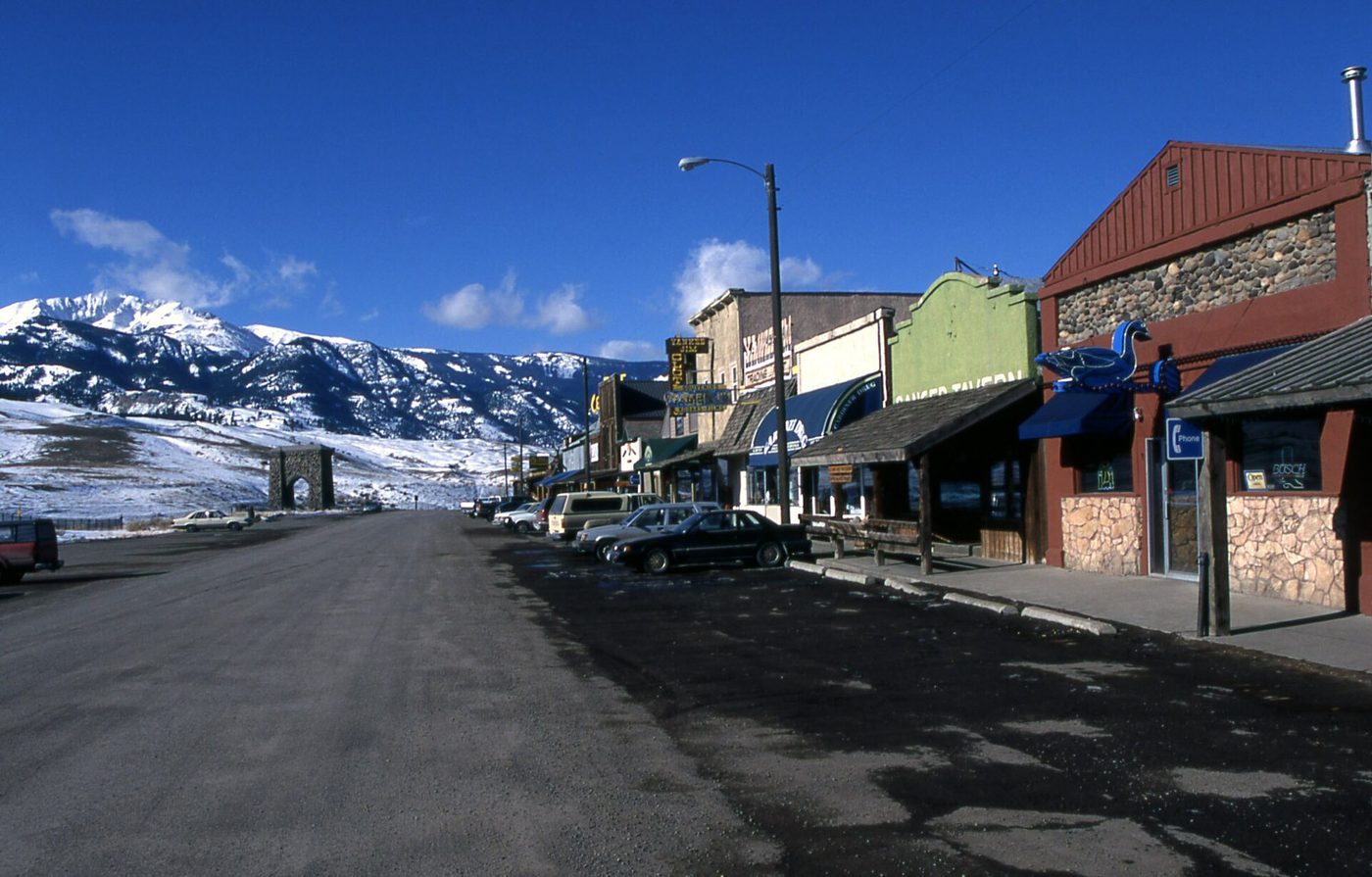 The main street of Gardiner, Montana, with snowy Electric Peak behind it