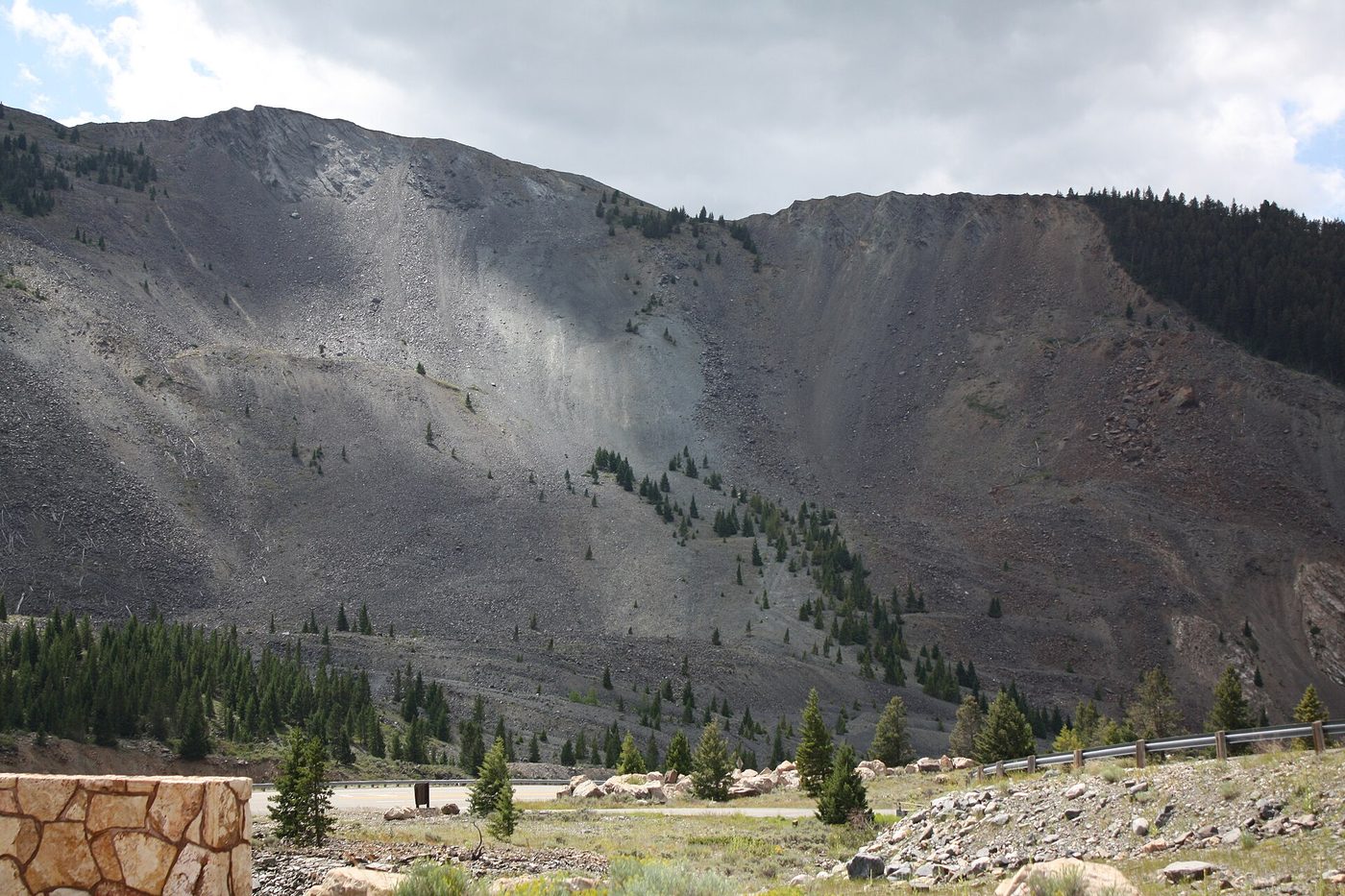 The bare scar of the 1959 landslide on a mountainside above the Madison River