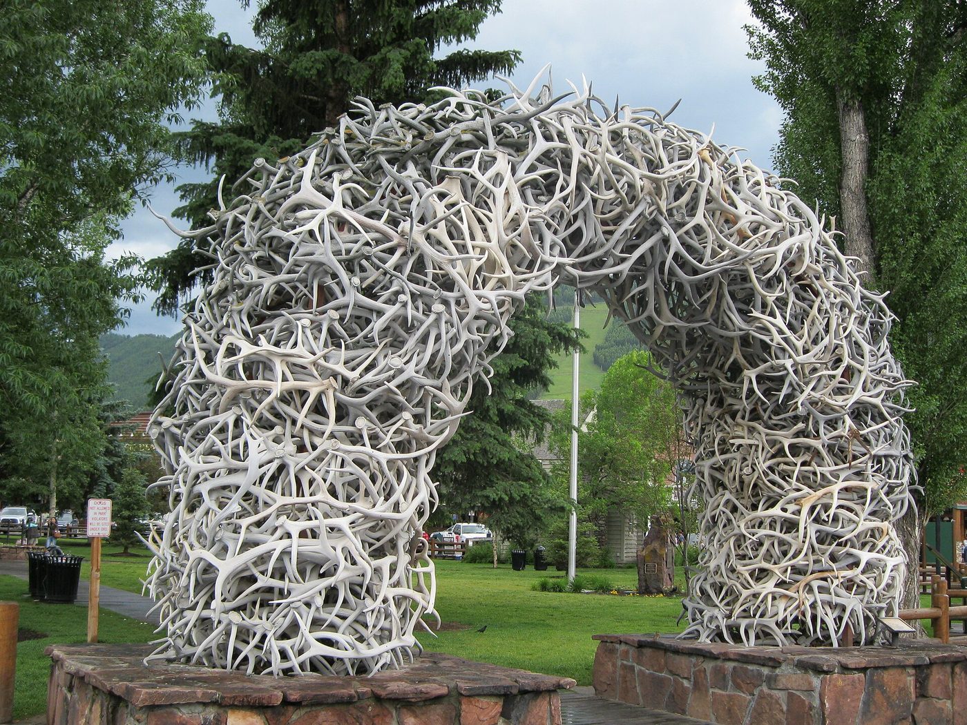 Arch built from hundreds of shed elk antlers at a corner of Town Square